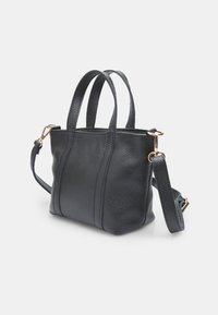 Small black leather tote bag with textured surface, dual top handles, and adjustable shoulder strap. Features gold hardware accents.