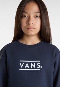 Felpa blu navy in misto cotone, con logo "VANS" bianco sul petto e collo a giro con bordi a coste.