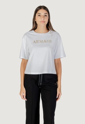 Witte cropped t-shirt van katoen, met korte mouwen en een gouden glitter 'ARMANI EXCHANGE' logo op de voorkant.