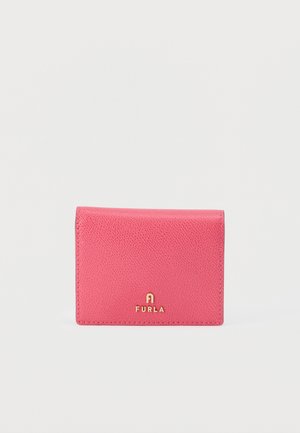 Pink textured leather Furla wallet with gold logo lettering centered on front against a plain white background.