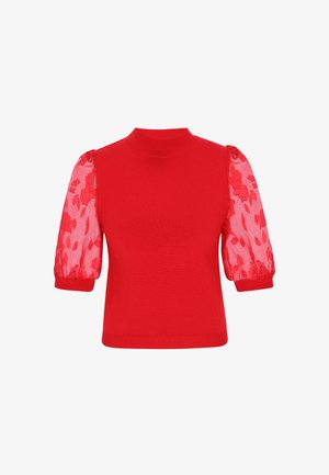 Punainen neulepusero, jossa on korkea kaulus ja lyhyet liehukehihat, valmistettu läpikuultavasta kankaasta, jossa on kukkakuviot. Vahva vartalo ja resorireunaiset hihansuut.