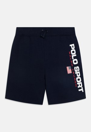 Calções de banho azul marinho feitos de tecido macio, com uma cintura ajustável por cordão e texto branco em destaque: "POLO SPORT" ao lado de um pequeno detalhe da bandeira americana.