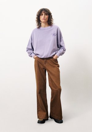 CHERRY - Flared Jeans - camel
