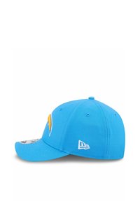 Light blue cap with a curved brim, featuring an embroidered logo in yellow and white on the front and a stitched logo on the side.