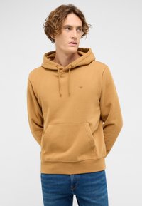 Bluza z kapturem w musztardowym kolorze, wykonana z bawełny, z przednią kieszenią, regulowanymi sznurkami oraz subtelnym logo na piersi.