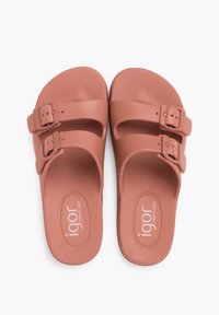 Sandali in gomma rosa con due fibbie regolabili, superficie texturizzata e logo sulla soletta, adatti per un abbigliamento casual.