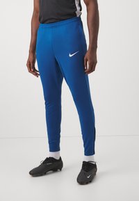 Nike Performance STRIKE PANT - Treniņtērpa apakšdaļas - court blue/white