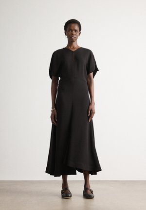 Black midi dress with short, loose sleeves and a keyhole neck detail. Soft, smooth fabric with a flowing skirt and an A-line shape.