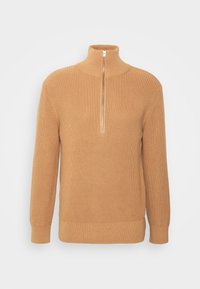 Beżowy dzianinowy sweter z wysokim kołnierzem i półzamkiem, charakteryzujący się prążkowaną fakturą i dopasowanymi mankietami. Bezszwowy fason z miękkiego materiału.