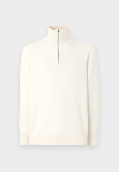 Maglione bianco con zip e collo alto, a maniche lunghe. Realizzato in tessuto morbido, presenta una trama liscia e un design minimalista.