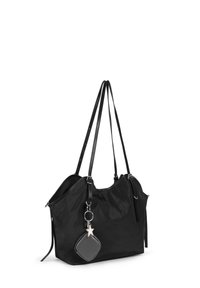 Sac en toile noir avec deux anses en cuir, fermeture éclair et un porte-clés détachable avec un design en étoile.