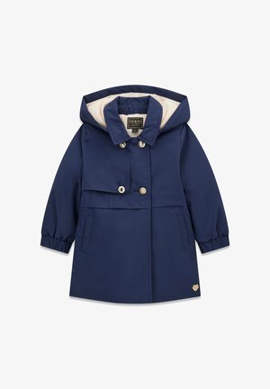 Manteau à capuche bleu marine pour enfants avec doublure beige, boutons devant, deux poches latérales, poignets élastiques et un petit emblème en forme de cœur près de l'ourlet.