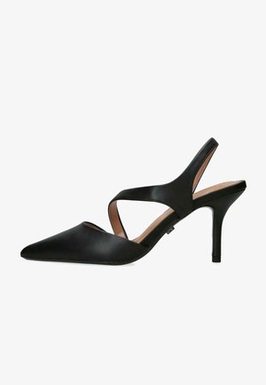 Tacchi a punta in pelle nera con cinturino sottile alla caviglia e tacco a stiletto moderato. Texture liscia e design minimalista.