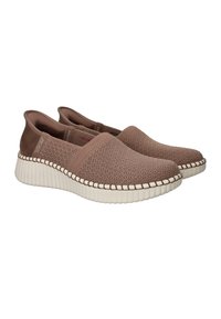 Brown slip-on shoes made from a textured knit material, featuring a white ribbed sole and contrasting stitching detail around the edges.