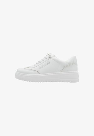 White leather sneaker with a textured finish, thick white sole, lace-up front, and embossed logo detail on the side.