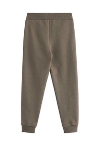 Olivgrüne Sweatpants aus einem weichen Baumwoll-Mix. Mit einem gerippten Bund und Bündchen an den Knöcheln. Minimalistisches Design, ohne Muster oder Akzente.