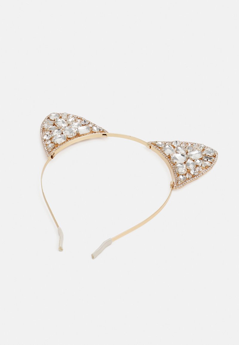 Złota opaska na głowę w kształcie uszu kota, ozdobiona przezroczystymi rhinestones. Gładka, metalowa rama z miękkimi plastikowymi końcówkami.