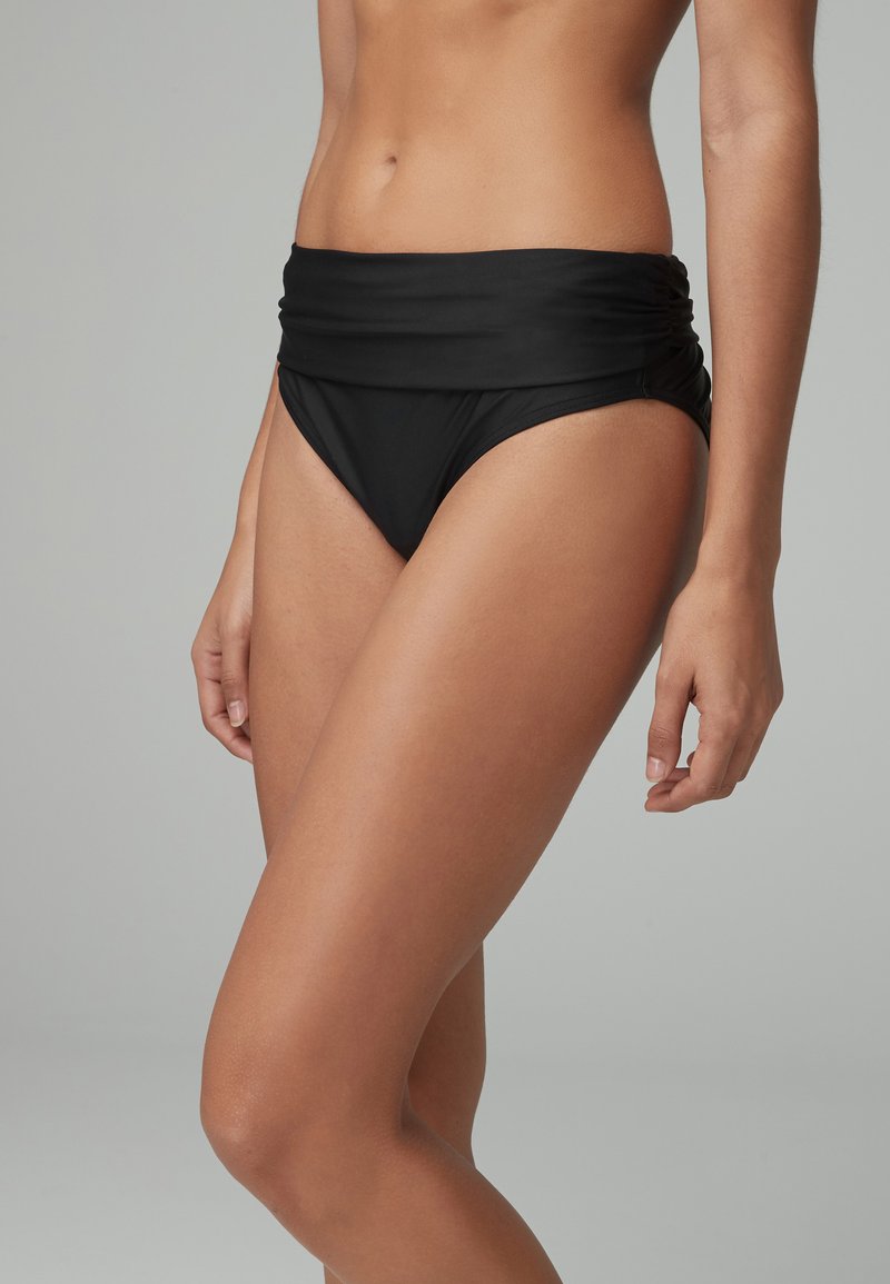 Schwarze hochgeschnittene Bikiniunterhose mit gerafftem, gefaltetem Material am Bund und nahtlosem Finish, entworfen für eine figurbetonte Passform.