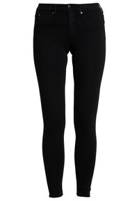 Jeans skinny negros con una textura de denim suave, con una cintura de altura media, cierre con cremallera y un diseño minimalista sin logotipos ni patrones visibles.