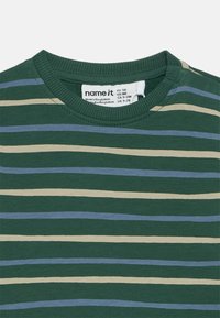 Green baby shirt with blue and beige horizontal stripes and ribbed crew neckline, size EU 56, made in Bangladesh.