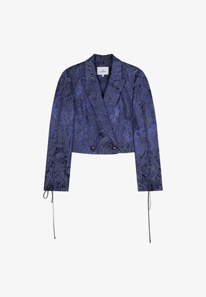 Cropped jacket in dark blue fabric with a textured floral pattern, double-breasted design, and ties at the sleeve cuffs.