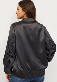 Ellos Plus collection Bomberjacks - schwarz