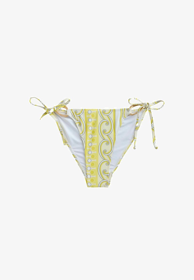 Bas de bikini jaune et blanc avec motifs tourbillonnants et à pois, cordons noués sur les côtés, présentés à plat sur un fond blanc.