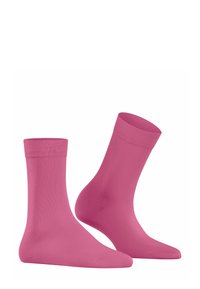 Rosa Baumwollsocken mit geripptem Bund, die eine glatte, matte Textur und eine mittellange Knöchellänge für Komfort und Passform aufweisen.