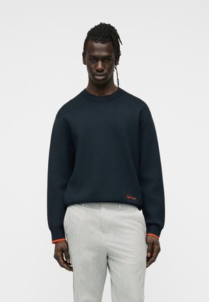 RICO - Striktrøje - salute