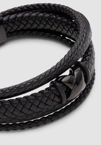 Black leather bracelet featuring braided texture, double wrap design, and a glossy black clasp detail.