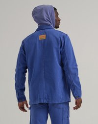 Blue corduroy jacket with a hood, featuring a Lee Crayola label. Buttons on cuffs and distinctive vertical ribbed texture.