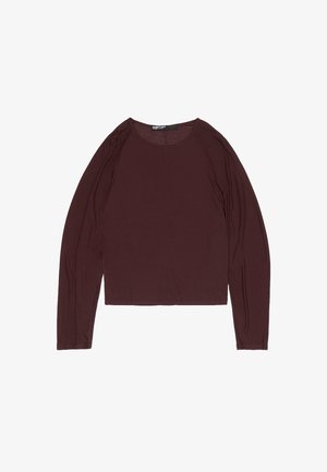 Burgundia pikaaelise topp, valmistatud pehmest materjalist. Omab ümmargust kaelust ja lühendatud disaini koos soonikdetailidega mansettidel.