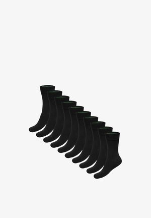 Zehn Paare schlichter schwarzer Socken in Crew-Länge, diagonal auf einem weißen Hintergrund angeordnet.