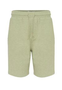 Lichtgroene shorts van gestructureerde stof, met een elastische tailleband met trekkoord en zijzakken.