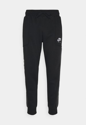 Pantalones deportivos - black