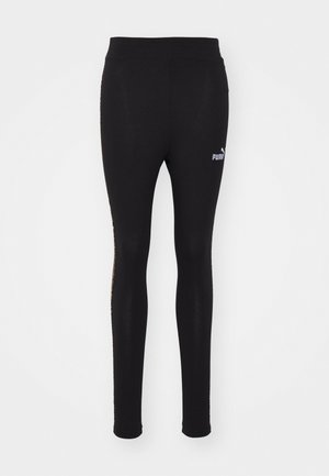 Fekete leggings rugalmas anyagból, magas derékkal, szűkülő lábszárral és a bal oldalon diszkrét Puma logóval.