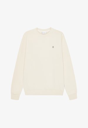 Kremowa bluza z długimi rękawami, ściągaczami na mankietach i u dołu, okrągłym dekoltem oraz dyskretnym, zielonym haftem "II" na piersi.