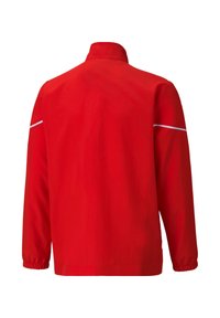 Rote Jacke mit hochgeschlossenem Kragen, langen Ärmeln und elastischen Bündchen. Verfügt über weiße Akzentstreifen an den Schultern. Glattes, leichtes Material.