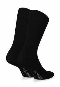 Czarne skarpetki wykonane z gładkiego materiału. Wysoka długość do kolan z prążkowanymi mankietami i białym logo na dole.