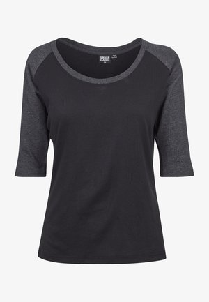 Sort bomulds T-shirt med trekvartlange grå ærmer, rund halsudskæring og ribbet tekstur. Mærket siger "URBAN CLASSICS," størrelse XS.