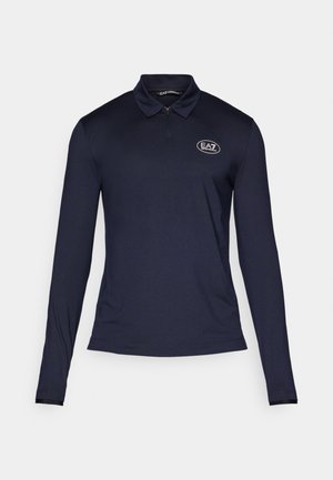 Navy long-sleeve polo shirt with a zip collar, textured fabric, featuring an EA7 logo on the left chest. Solid color, minimalistic design.