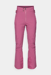 Roze skibroek van waterdicht materiaal, met een rits aan de voorkant, twee knoopsluitingen, zijzakken en uitlopende onderranden.