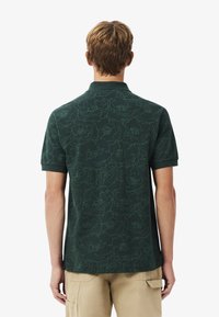Lacoste Poloshirt - vert yzp