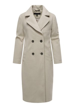 Dubbelzijdige jas in lichtbeige, gemaakt van zachte wolachtige stof. Heeft zwarte knopen, zijzakken en een reverskraag.