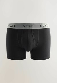 Svarta boxershorts med en mjuk elastisk grå midjeband, med varumärkesnamnet "NEXT" i svarta bokstäver. Slät textur och figursydd design.