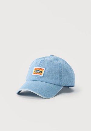 Light blue denim baseball cap with a sewn patch reading "SARDINES SEA MARKET" and an illustrated fish.