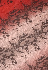 Black lace overlay on a gradient background, transitioning from red to light pink. Features intricate netted patterns with varying textures.