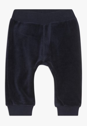 Pantalon pour bébé bleu marine doux avec taille et poignets élastiques, en tissu velours pelucheux pour le confort et la chaleur.