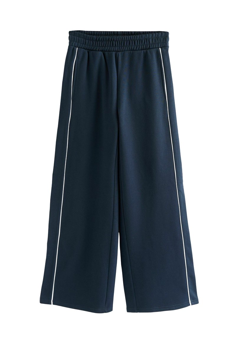 Pantaloni largi de culoare bleumarin, cu talie elastică și dungi albe pe ambele picioare, proiectați pentru uz casual.