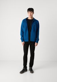 BOSS SAGGY - Tröja med dragkedja - open blue